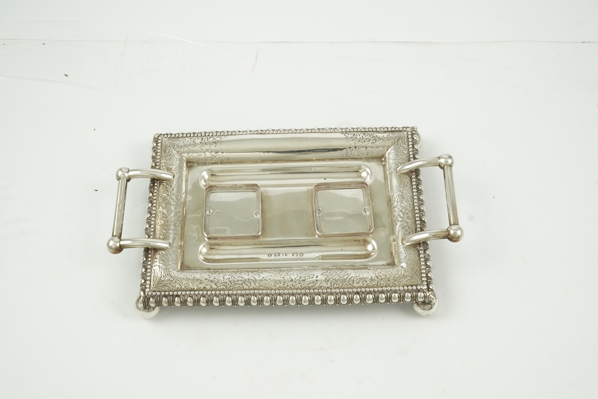 A late Victorian silver two handled rectangular inkstand by George Unite